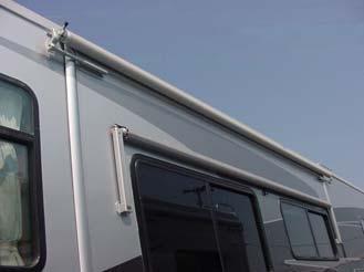 position. If there is a remote switch inside the motor home, one can activate the awning from inside the motor home by pressing the rocker switch upwards to the extend position.