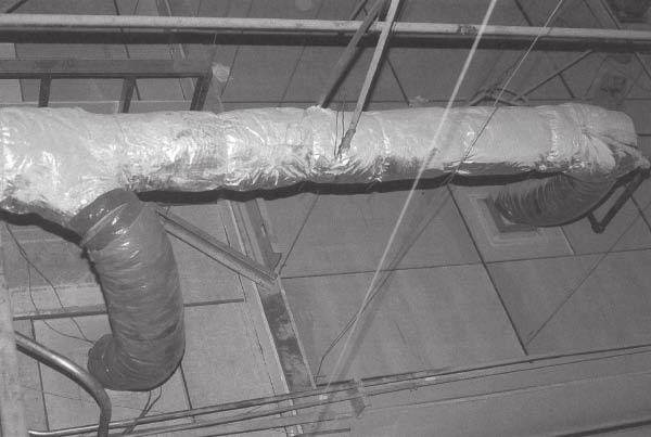 118 HVAC Fundamentals Figure 8-2. Round duct wrapped with vapor-barrier insulation. variable air volume terminal boxes. The terminal boxes may be single or dual inlet.