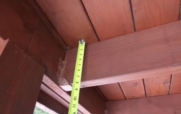 3 Item 5(Picture) Support post rear porch 2.3 Item 6(Picture) Deck flooring under carpet 2.
