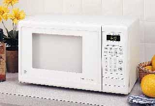 oven cavity 600 watts* Convenience Cooking Controls for Beverage, Popcorn, Frozen Pizza, Dinner Plate, Baked