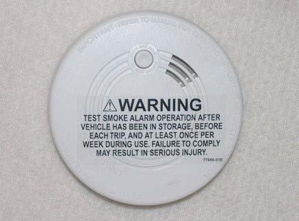 The smoke alarm is powered by a 9-volt battery and has a sensor that is designed to detect smoke.