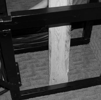 long 2x4 board), make sure that the top of the board is seated firmly against the aluminum tube at the top of the bed board and make sure the bottom of the board is seated firmly against the steel