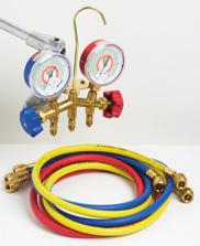 Connect a second yellow hose from the recovery system to the recovery tank. Open the liquid port on your manifold gauge, the valve on the recovery tank, and the valve on the recovery machine exhaust.