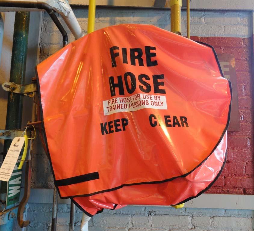 USE BY TRAINED PERSONS ONLY". This means fire hoses are for Fire Fighters ONLY!