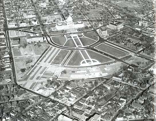 Aerial view of the Capitol with Summit Mall ending at St. Anthony Avenue at the left and Cedar Street at the right, ca. 1954.
