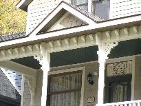 Decorative wood shingles, half-timbering, friezeboard and bargeboard detailing, crown detail, and window placement all impact