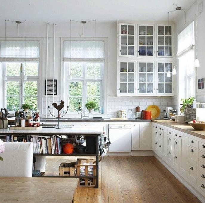 OPEN-FACE GLASS CABINET DOORS Traditional farmhouse kitchens, especially in French or Victorian country styles, look fantastic with glass display cabinets, which allow you to show off
