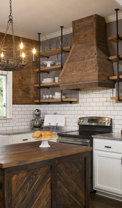 DON T FORGET THE HOOD The range hood is an oft-forgotten piece of the kitchen but is a great way to add some distinctive personality to your farmhouse kitchens.