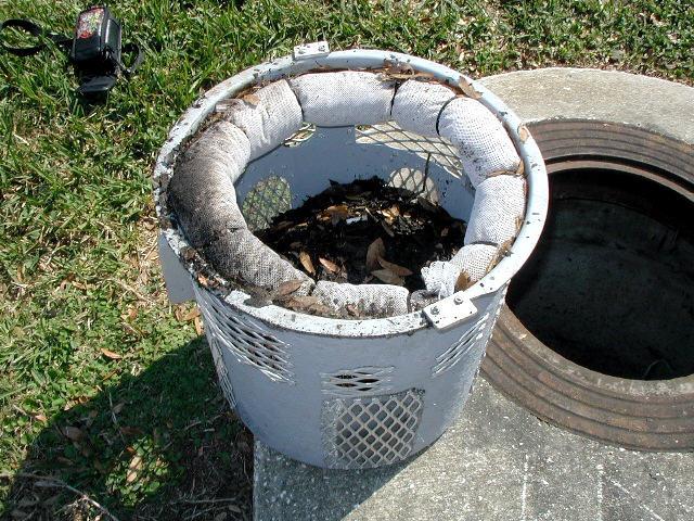 Remove filtration basket either by hand or with manhole hook tool. Cut zip ties, remove StormBoom and dispose. Attach new StormBoom with zip ties. Brush filtration basket screens clean if necessary.