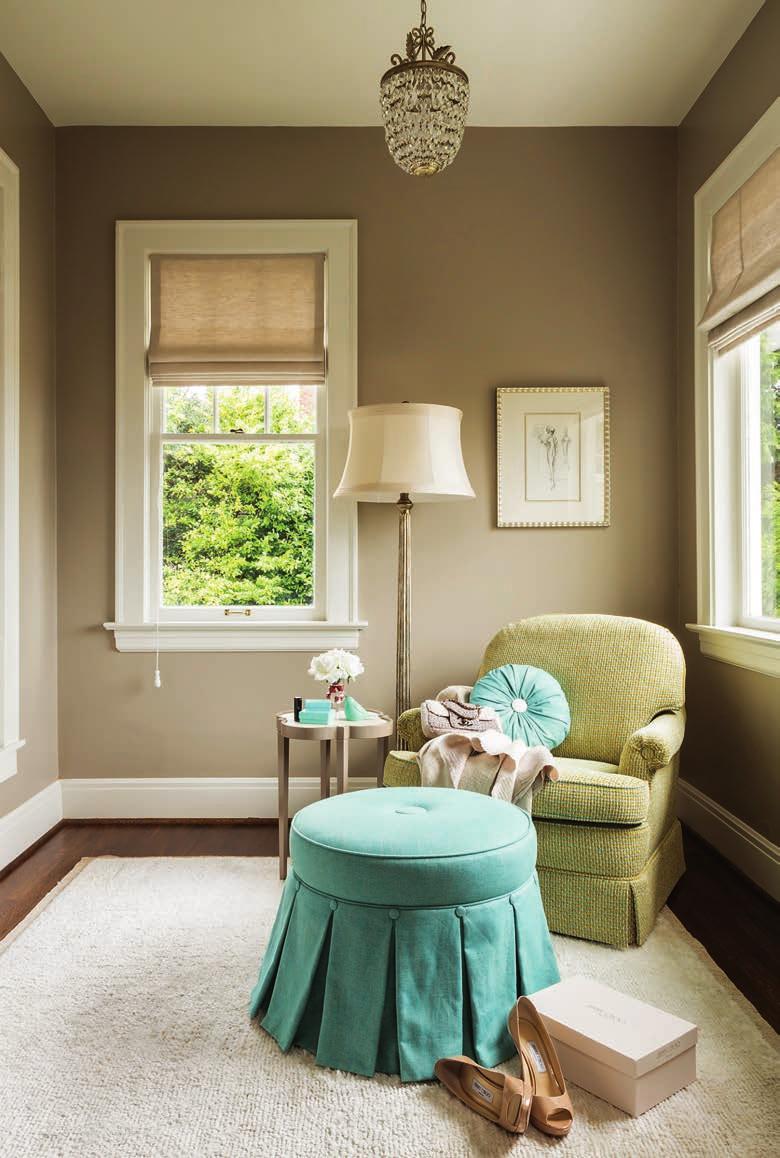 Walls painted in Divine Butter provide a foil for bright pops of color in the valances, rug and throw pillow. Practical touches include blackout shades and lots of storage.