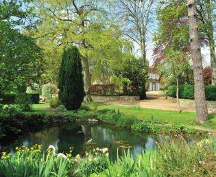 The gardens are complemented by two paddocks, one of which has separate access directly from the village lane.