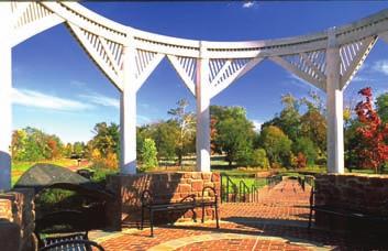Provide seating in public areas. Locate seating to take advantage of attractive views. This pavilion with benches is a destination within this park in Alexandria, Virginia.