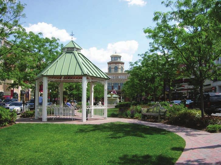 The bandstand in the park and the tower down the street are complementary architectural features that contribute to a sense of community.