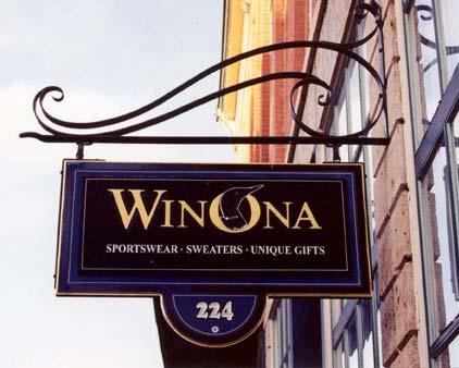 Awning signage or lettering should be limited to the hanging vertical flap of the awning and be complementary in color to the building front façade.
