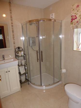Shower Room: 6 11 x 6 10 High specification finish with fully tiled floor and walls,