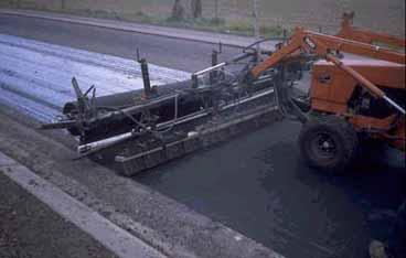 Paving Fabric System A polypropylene non-woven fabric, heat bonded on the surface and designed to accept