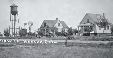 granaries are springing up everywhere. From left to right: The Swedish Lutheran Church, Lutheran Church Parsonage, and Residence of R. H. Groff, c. 1910s 322 and 330 N.