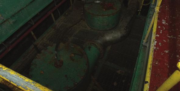 Floor level feed conveyor from FLT BCI pulper, 16 dia., D section mild steel tub with S/S liner. No. 3 gearbox drive.