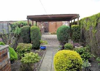 At the rear there is an excellent sized garden that has been designed for low maintenance and has a large open car port and parking for two vehicles.