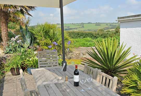 Sutton Cross House South Milton, Kingsbridge, Devon, TQ7 3JG A well-presented five bedroom house with beautiful gardens and stunning views over the South Hams Kingsbridge 2 ½ miles, Thurlestone and