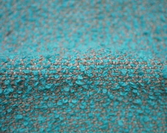 Flirt is a vivid boucle fabric with a fluffy textural yarn that creates an immediate sense of comfort.