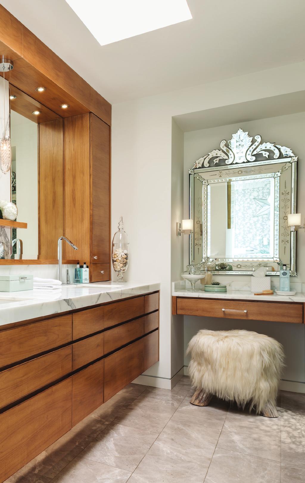DESIGN TORONTO SPRING 2016 Candice s eclectic style means that a sleek, contemporary floating walnut vanity and makeup counter meet a furry Tibetan yak-hair stool in the master bathroom.
