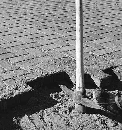If the pavement has been subject to vehicular traffic for a length of time, the first paver may be need to be broken in order to be removed. A small sledge hammer (3 lb.