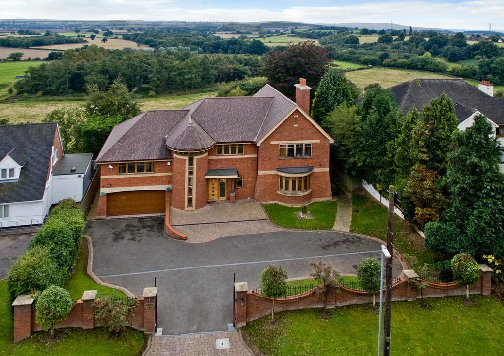 MANESTY PATTINGHAM ROAD PERTON RIDGE WOLVERHAMPTON WV6 7HD One of the finest residences within the area with stunning views in a prestigious address.