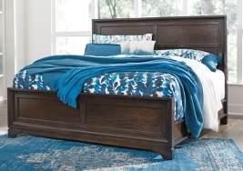 Exclusive) Contemporary group made with Birch veneers and Rubberwood solids in a transitional cherry finish Bedroom pieces feature a floating top design set on picture framed cases