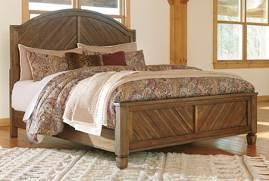 B652 Colestad (Ashley HS Exclusive) Heritage Road group finished in a natural Acacia color with burnished effects Constructed with Acacia veneers and Rubberwood solids Arched panel bed has chevron