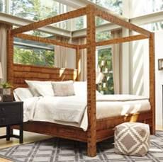 reclaimed lumber in a two-tone bedroom group Combines rustic rubbed black finish with distressed reclaimed lumber finish Made with Acacia veneers