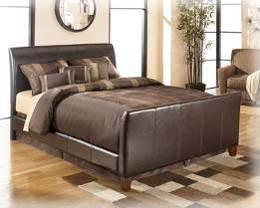 Cal King Poster Bed (151/72/95) Queen Poster Bed (150/71/98) B465 Stanwick (Signature Design BED ONLY) Fully upholstered faux brown