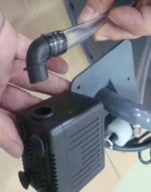 Use screw driver to remove 3 galvanized screw with