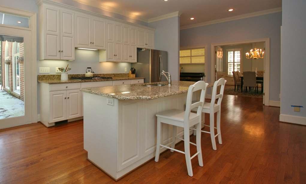 Kitchen 31 x 16 4 (w/breakfast area) Hardwood floor; raised panel painted cabinets; granite tops; new