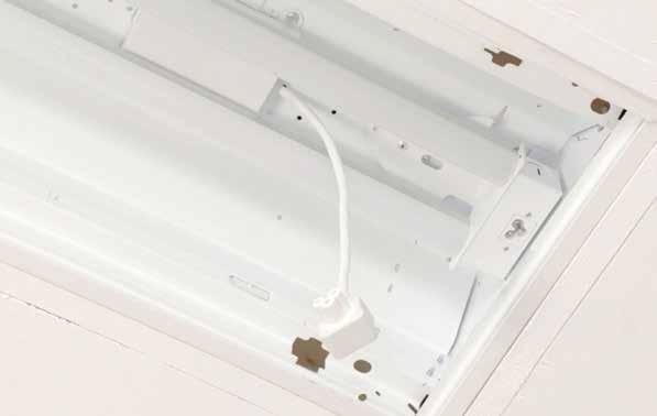 Attach the LED RetroFit to the fixture cover using the powerful rare earth magnets.