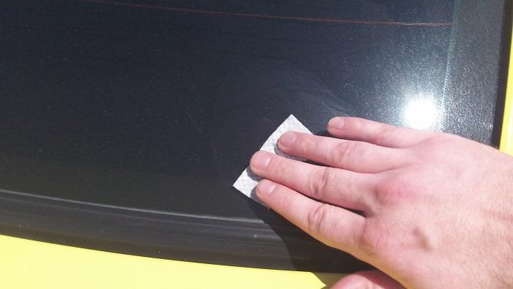 4. Next, repeat the process with the 3M adhesion promoter pad. While doing this step, be sure not to touch the louvers or your paint with your fingers.
