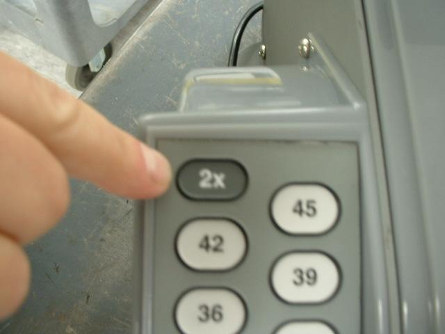 6. To dispense a Random length of tape, press the Random keypad with the arrow and
