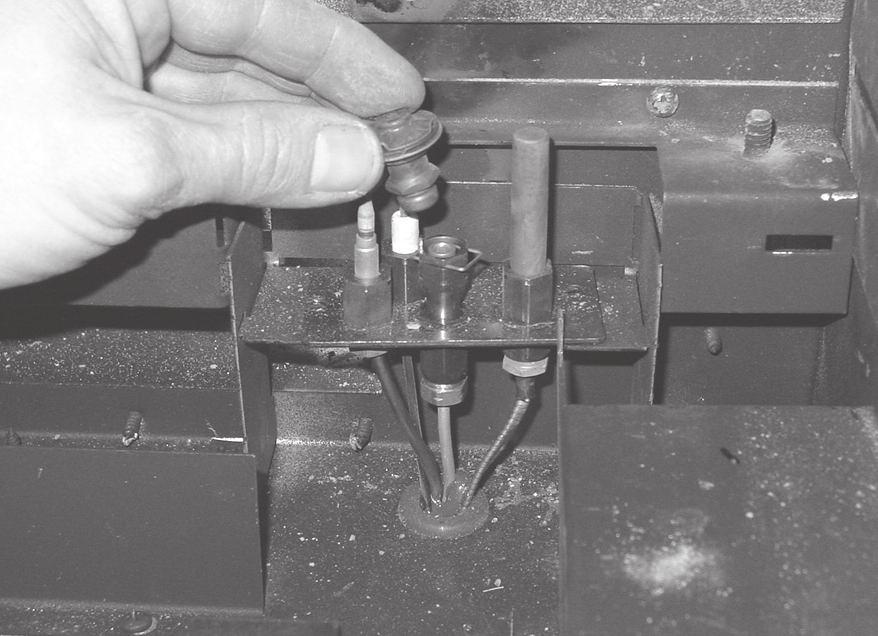 wrench remove the orifice retaining nut. Replace with appropriate orifice. (.076 LP /.125 NG) A B C Figure 6.6 - Remove pilot hood and set aside. NOTE: Do not remove retaining clip from pilot hood.