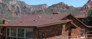 If red rock is not used as the primary building material, it should be somehow