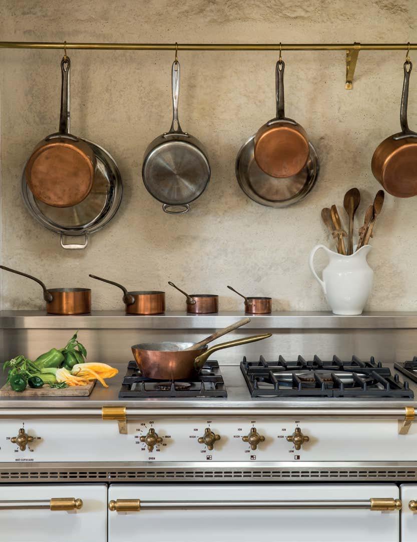 We embrace the beauty of natural materials. Copper, brass and stainless steel mix wonderfully in our kitchen.