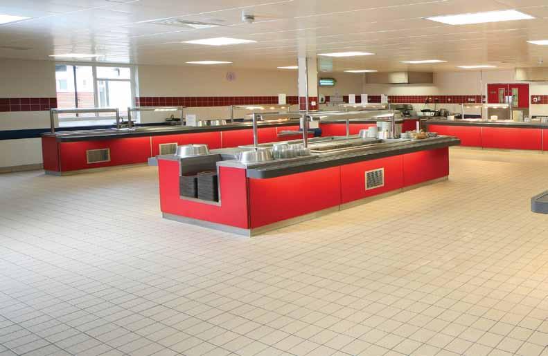 Curved stainless steel topped counter in high school complete