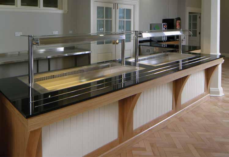granite topped fixed counter with Synergy drop-ins,