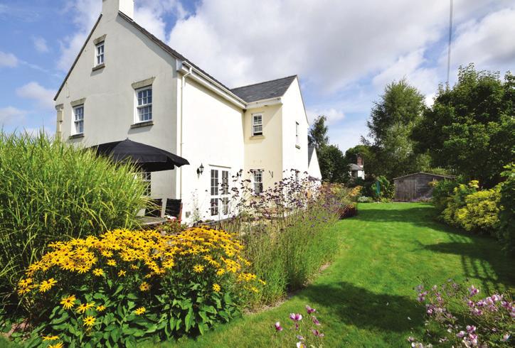 Step outside Penheligan House The property is approached off the village lane via a gated entrance onto a wide turning area with parking for several vehicles leading to the: ATTACHED DOUBLE GARAGE 18