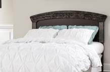 Dark finish is complimented by nickel foiled fluting on mirror and bed Satin nickel color bail handles feature rope twist details