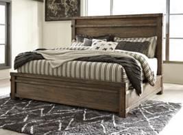 textured wire-brushed finish Cases have hefty casual urban look with block feet and thick tops Mansion bed echoes look and feel of