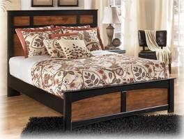 casual design in a two-tone warm brown finish over replicated cherry grain and black with a golden rub-through look