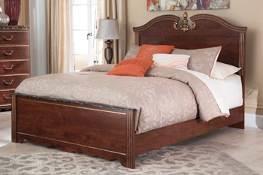 Beds available: Queen Panel Bed (54/57/96) Full Panel HB (57/B100-21) B164 Naralyn Traditional design in a reddish brown replicated cherry grain Features broken pediment style mirror and headboard