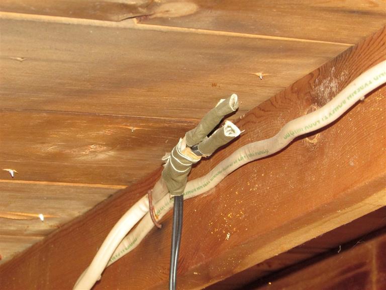 (2) There was one improperly terminated cable in the attic, which is a potential shock