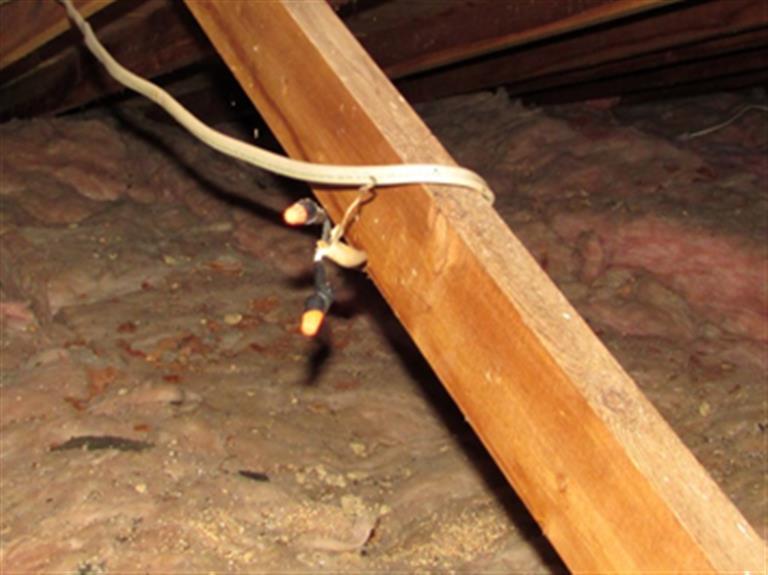 (3) There was a bare bulb light in the basement closet, creating a potential fire hazard.
