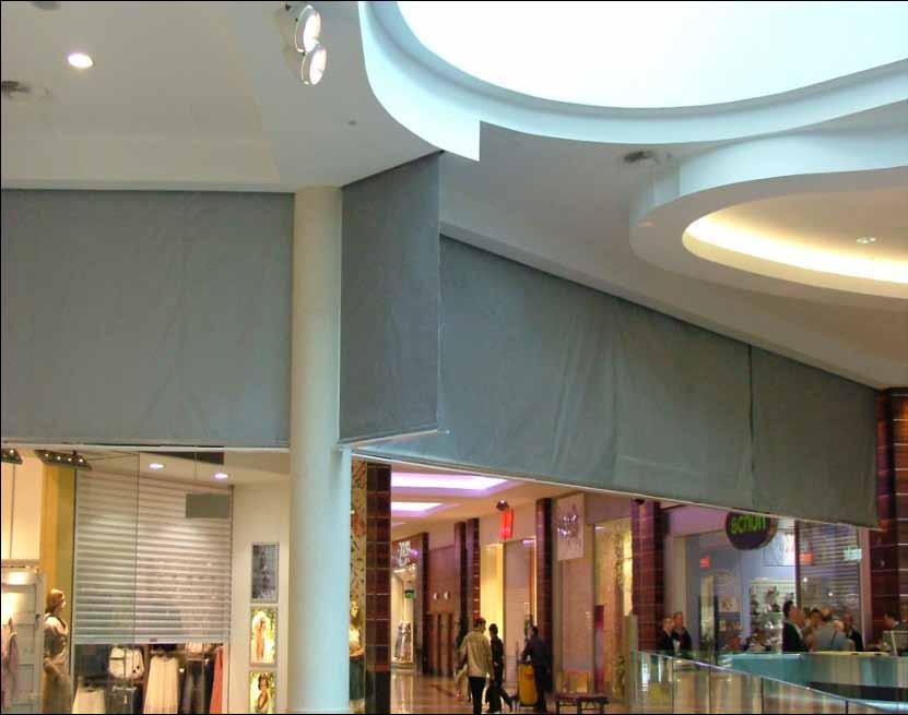 European Products Smoke Barriers: Description Smoke Barriers are like a large electrically operated roller blind. Whereby they are concealed above a ceiling out of view.